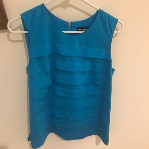 Blue ruffled blouse